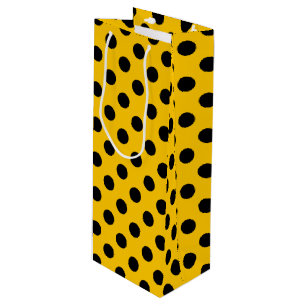 Black polka dots på gult