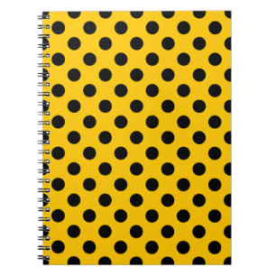 Black polka dots på gult anteckningsbok med spiral
