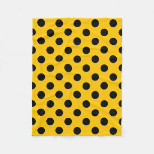 Black polka dots på gult fleecefilt