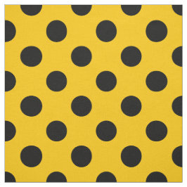 Black polka dots på gult tyg