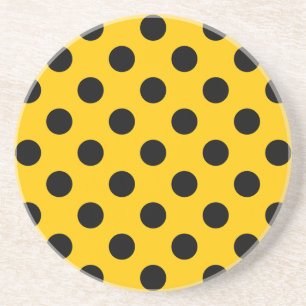 Black polka dots på gult underlägg sandsten