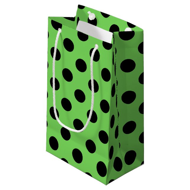 Black polka dots på kalkgrönt kalk (Framsidan Vinklad)