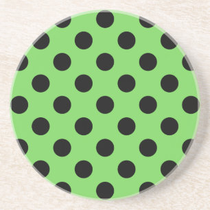 Black polka dots på kalkgrönt kalk underlägg sandsten