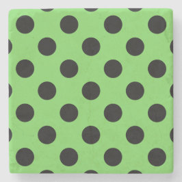 Black polka dots på kalkgrönt kalk underlägg sten