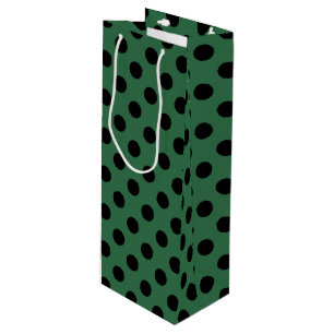 Black polka dots på kelly grönt