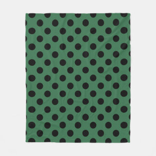 Black polka dots på kelly grönt fleecefilt