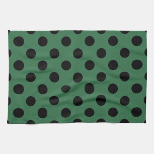 Black polka dots på kelly grönt kökshandduk