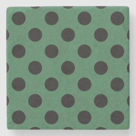 Black polka dots på kelly grönt underlägg sten