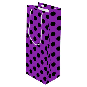 Black polka dots på lila
