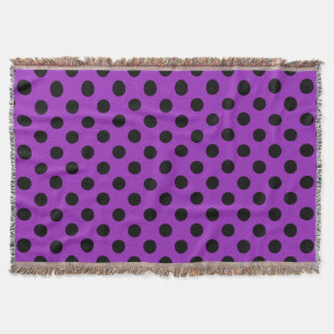 Black polka dots på lila filt