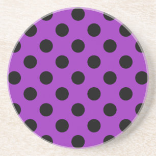Black polka dots på lila underlägg
