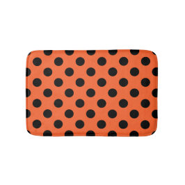 Black polka dots på orange badrumsmatta