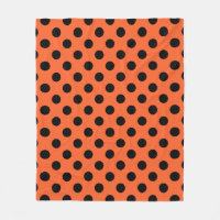 Black polka dots på orange