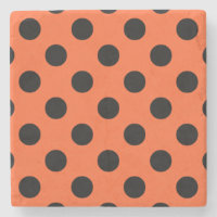 Black polka dots på orange