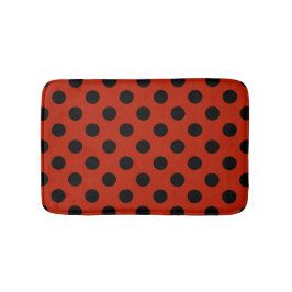 Black polka dots på röd badrumsmatta