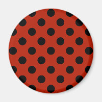Black polka dots på röd