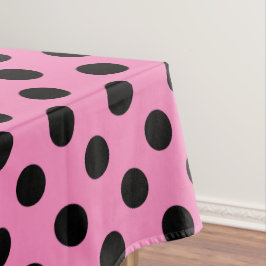 Black polka dots på rosa