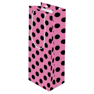 Black polka dots på rosa