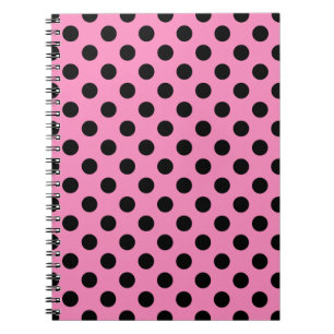 Black polka dots på rosa anteckningsbok med spiral