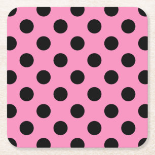 Black polka dots på rosa underlägg papper kvadrat