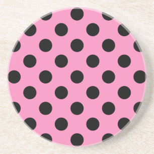 Black polka dots på rosa underlägg sandsten