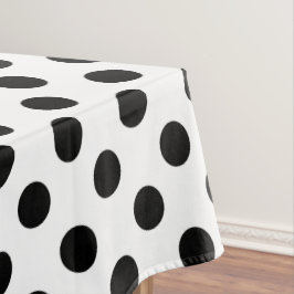 Black polka dots på vit