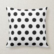 Black polka dots på vit bakgrundskudde