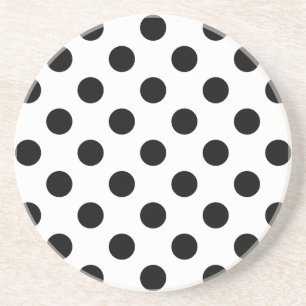 Black polka dots på vit underlägg sandsten