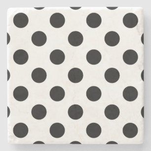 Black polka dots på vit underlägg sten