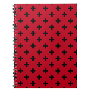 Black polka kor på rött anteckningsbok