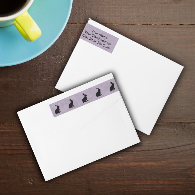 Black Rabbit Silhouette Påskhare Etikettband (Row of black silhouette rabbits on marbled purple wrap around return address labels.)