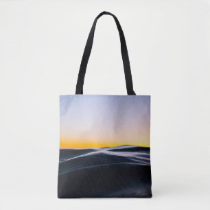 BLACK SAND UNDER ORANGE HIMLAR UNDER SUNSET TYGKASSE