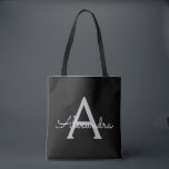Black Silver Modern Script Girly Monogram Namn Tygkasse<br><div class="desc">Svart och Silver Elegant lägg till din egen Namn Monogram Bok Bag. Denna Bok-bag kan anpassas så att den omfattar ditt första och första namn och ges som julklapp,  Sverige 16 födelsedagar,  Möhippa eller Bröllop.</div>
