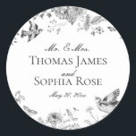 Black Toile De Jouy Vintage Floral Wedding Favor Runt Klistermärke<br><div class="desc">Love is in bloom! Transform your celebration with our Black Toile de Jouy Party Decor Collection. This elegant chinoiserie showcases intricate chinoiserie wildflowers, birds, and butterflies, all meticulously designed to create a sophisticated and timeless atmosphere. With detailed florals and a timeless black and white palette, this collection adds a touch...</div>