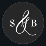 Black Whimsical Calligraphy Wedding Monogram Runt Klistermärke<br><div class="desc">Add a charming finishing touch to your wedding stationery or favors with this wedding sticker featuring a whimsical calligraphy ampersand. Designed with a romantic yet modern flair, this sticker is perfect for sealing envelopes, decorating favor boxes, or adding a personalized detail to welcome bags and more. The hand-drawn ampersand adds...</div>