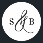 Black Whimsical Calligraphy Wedding Monogram Runt Klistermärke<br><div class="desc">Add a charming finishing touch to your wedding stationery or favors with this wedding sticker featuring a whimsical calligraphy ampersand. Designed with a romantic yet modern flair, this sticker is perfect for sealing envelopes, decorating favor boxes, or adding a personalized detail to welcome bags and more. The hand-drawn ampersand adds...</div>