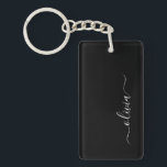 Black White Modern Minimalist Elegant Monogram Nyckelring<br><div class="desc">Vi presenterar vår moderna svartvita, minimalistiska monogramsamling: Enkelhet och sofistikering med våra minimalistiska utformningar, böjda för att sakta lyfta upp stil. Den här samlingen är skapad med ett stort öga för modern estetik och har en elegant svart och vit design som förstärks av monogram för personlig. Från chic till mångsidiga...</div>
