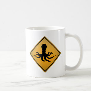 Bläckfiskvarning undertecknar kaffemugg
