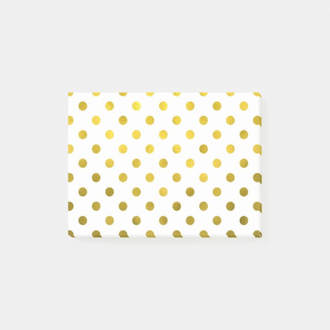 Bladguldet som den metalliska polkaen pricker på post-it block (Framsida)