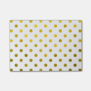 Bladguldet som den metalliska polkaen pricker på post-it block