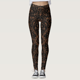 Bladhaltiga blommönster av bläckhaltig, svart, bru leggings