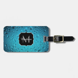 Blådroppar i snyggtens Coola vatten Bagagebricka