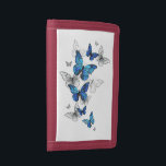 Blåflygande fjärilar Morpho<br><div class="desc">Flygande blå Butterflies morpho och vita fjärilar på en ljus abstrakt bakgrund. Morpho. Design med blå fjärilar morfin.</div>