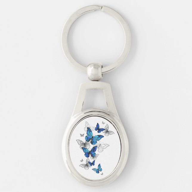 Blåflygande fjärilar Morpho Ovalt Silverfärgad Nyckelring (Framsidan)