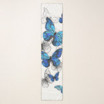 Blåflygande fjärilar Morpho Sjal<br><div class="desc">Flygande blå Butterflies morpho och vita fjärilar på en ljus abstrakt bakgrund. Morpho. Design med blå fjärilar morfin.</div>