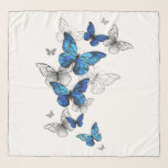 Blåflygande fjärilar Morpho Sjal<br><div class="desc">Flygande blå Butterflies morpho och vita fjärilar på en ljus abstrakt bakgrund. Morpho. Design med blå fjärilar morfin.</div>