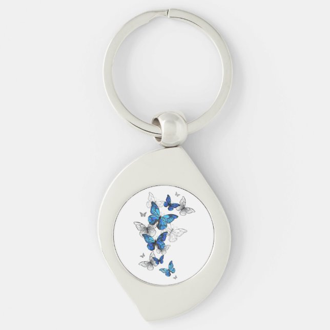 Blåflygande fjärilar Morpho Swirl Silverfärgad Nyckelring (Framsidan)