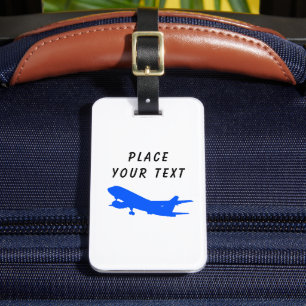 Blåflygplansbagagemärke med information bagagebricka