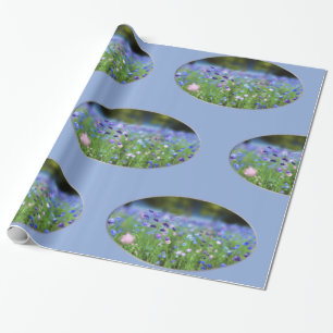 Blåklintblått som slår in papper presentpapper