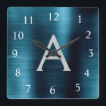 Blåmodern Elegant Metallic Monogram Namn Fyrkantig Klocka<br><div class="desc">Modern och Elegant Blue Faux Stainless Steel Foil Monogram Namn och första Personlig Anpassningsbar Wall Clock. Wall Clock ger perfekten till någon som kärlek trendig chic metallisk deka till ge som julgåva eller födelsedagspresent.</div>